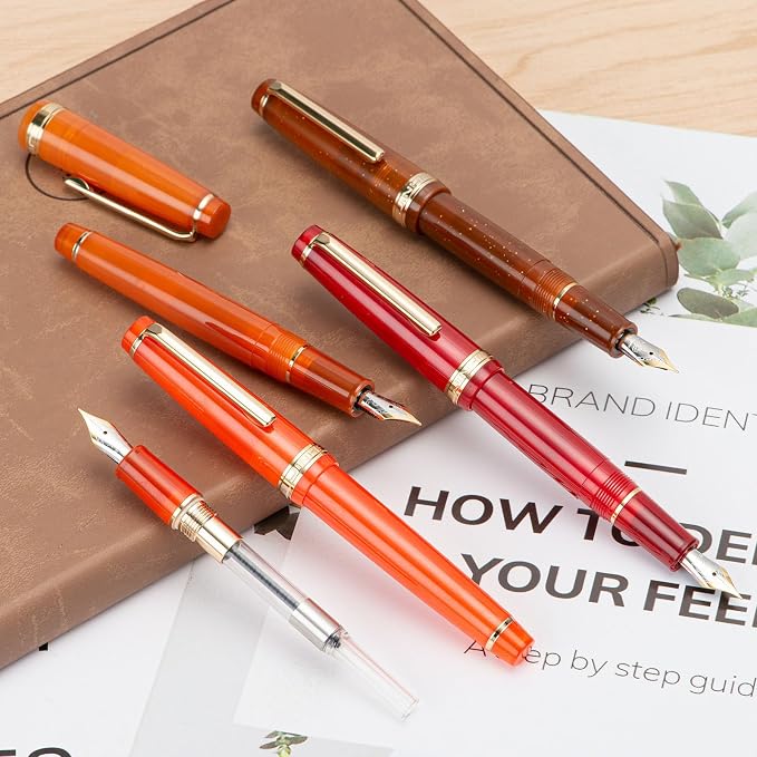 Jinhao 82 Acrylic Fountain Pen, Iridium Medium Nib with Ink Converter, Transparent Coffee Fluorescent Classic Design Smooth Writing Pen (Gold Trim)