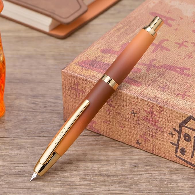 Jinhao 10 Press Fountain Pen with Box, Caramel Orange Gradient Retractable Fine Nib with Ink Converte Set (Golden Clip)